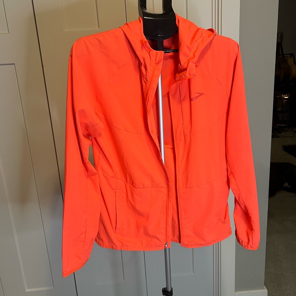 Brooks Women's Vibrant Orange lightweight jacket